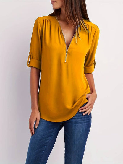 Belezza – casual, ruffled blouse with roll-up sleeves and half zip