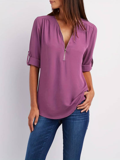 Belezza – casual, ruffled blouse with roll-up sleeves and half zip