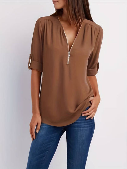 Belezza – casual, ruffled blouse with roll-up sleeves and half zip