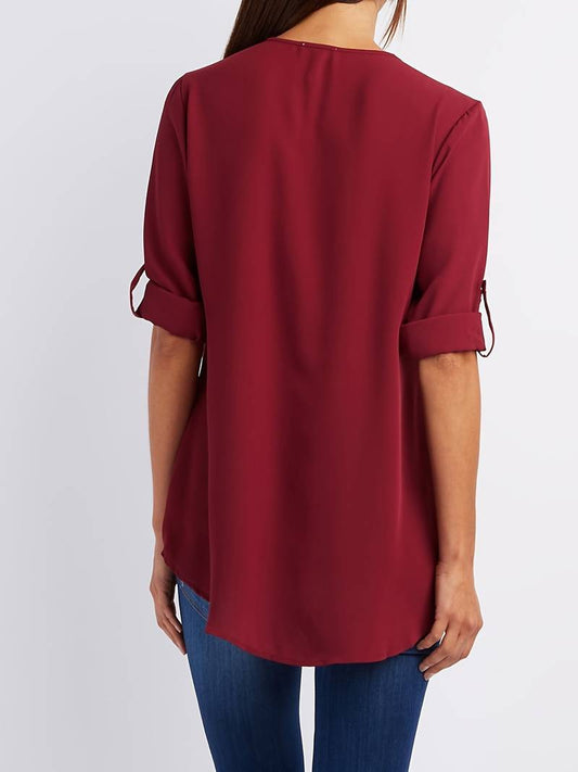 Belezza – casual, ruffled blouse with roll-up sleeves and half zip