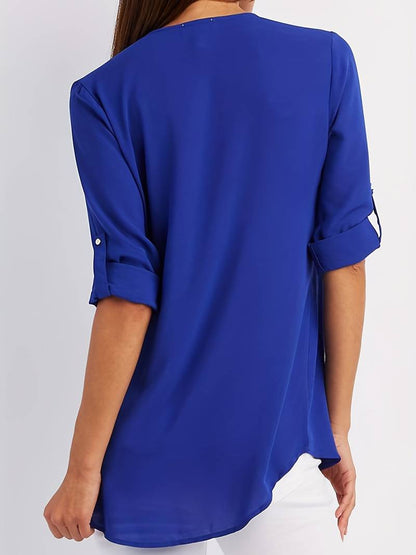 Belezza – casual, ruffled blouse with roll-up sleeves and half zip