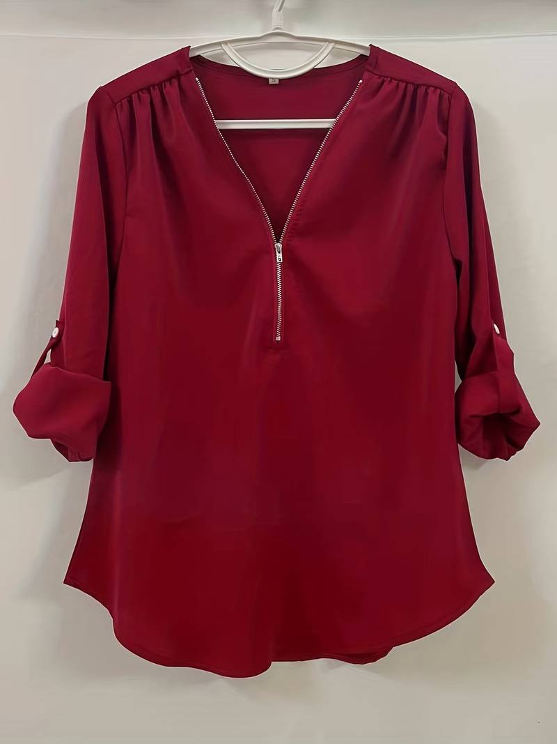 Belezza – casual, ruffled blouse with roll-up sleeves and half zip